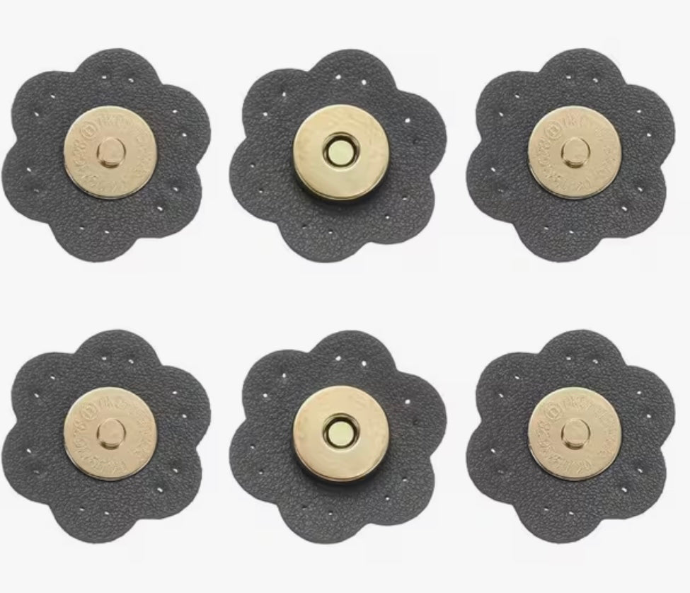 Bottoni a scatto con chiusura magnetica